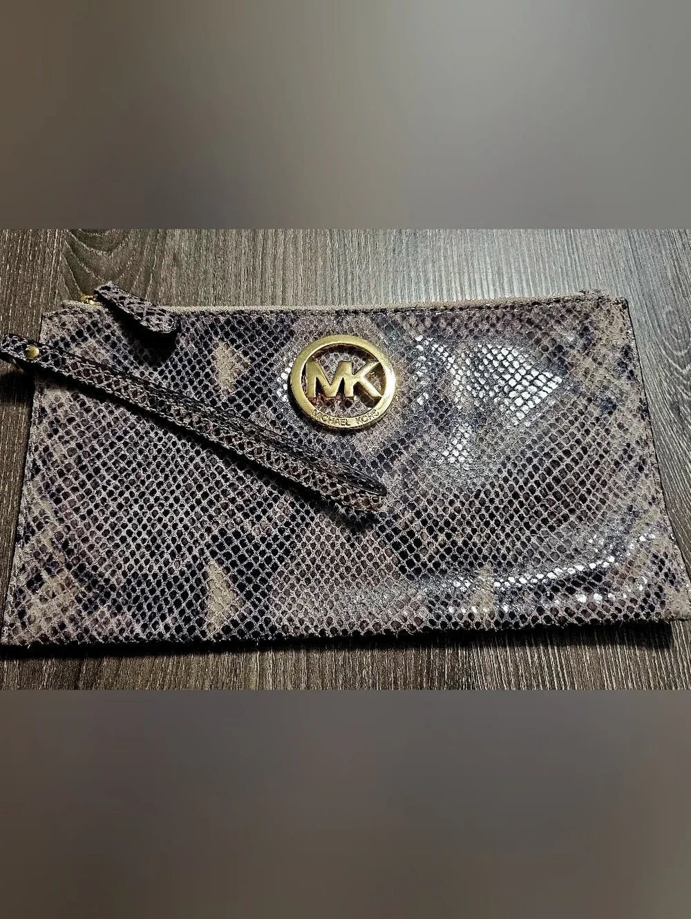 Authentic Michael Kors Snakeskin Large Wristlet Wallet with gold logo